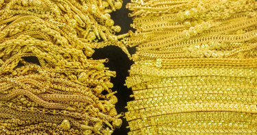 অবশেষে বিশ্ববাজারে স্বর্ণের দামে পতন