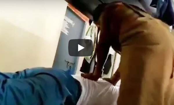 থানায় নারী সহকর্মীকে দিয়ে পুলিশের  ম্যাসাজ (ভিডিও ভাইরাল)